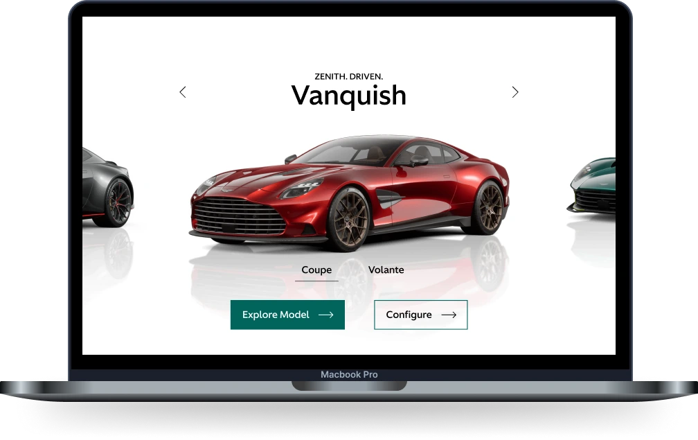 Laptop showing the Aston Martin website.